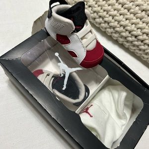 1C retro Jordan’s with newborn cap red white black